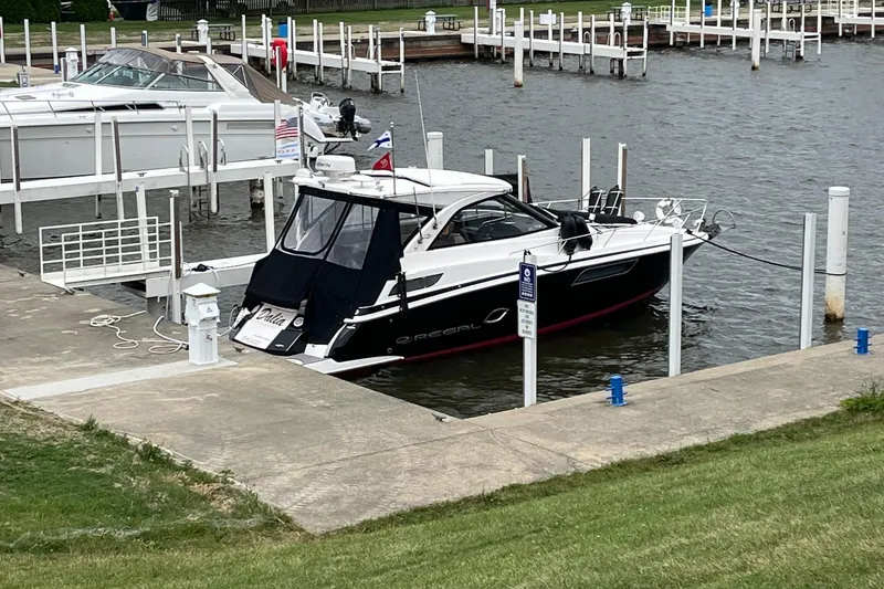 Slide: The Image of 2014 Regal 35 Sport Coupe boat docked in Chicago marina. - 6