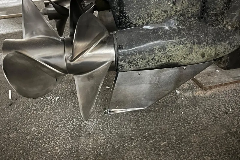 Slide: The Image of Interior of 2014 Regal 35 Sport Coupe with cozy bed and elegant wood cabinetry. - 60