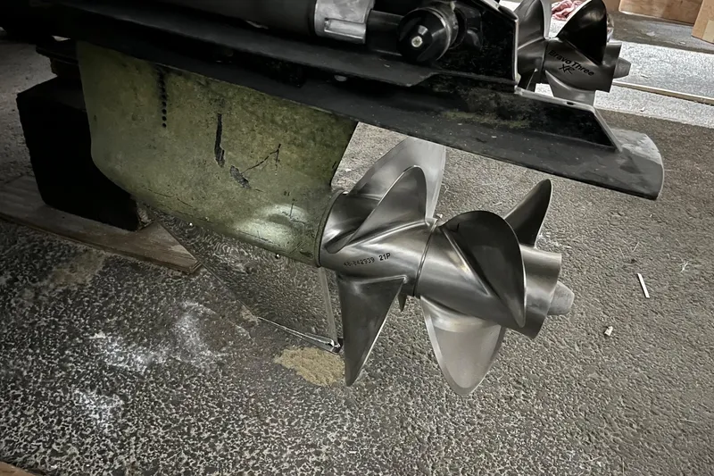 Slide: The Image of Interior of 2014 Regal 35 Sport Coupe with beige seating and wooden flooring. - 61