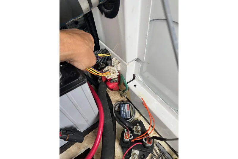 Slide: The Image of Close-up of a 2014 Regal 35 Sport Coupe boat propeller and hull. - 67