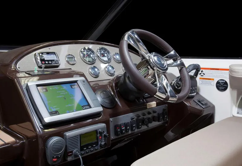 Slide: The Image of Manufacturer Provided Image: 2014 Regal 35 Sport Coupe dashboard with navigation system and controls. - 82
