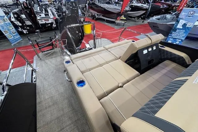 Slide: The Image of 2026 Barletta Lusso 25UC pontoon boat interior with luxurious seating and cup holders. - 13