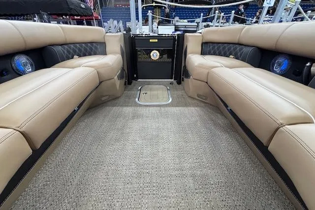 Slide: The Image of Luxurious interior of 2026 Barletta Lusso 25UC pontoon boat with plush seating and carpeted flooring. - 30
