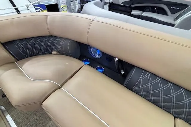 Slide: The Image of Luxurious seating in 2026 Barletta Lusso 25UC pontoon boat with elegant stitching and built-in speakers. - 31