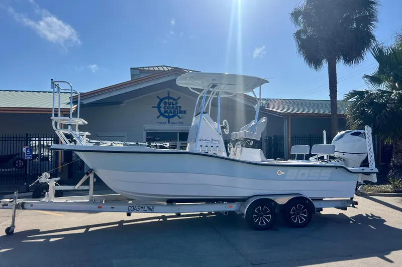 The Image of 2026 Shallow Stalker "The Boss" boat on trailer at Gulf Coast Marine dealership. - 0