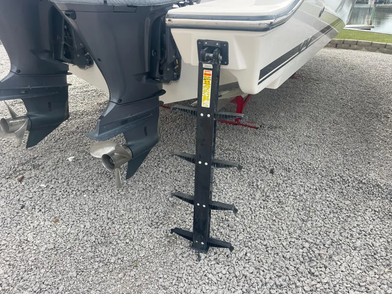 Slide: The Image of 2016 Pursuit DC 325 Dual Console with outboard motors. - 11