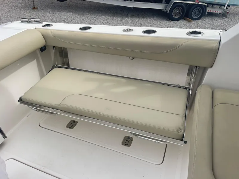 Slide: The Image of Bench seat in Pursuit DC 325 Dual Console boat, year 2016. - 19