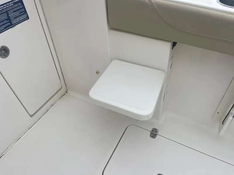 Slide: The Image of Folding seat on Pursuit DC 325 Dual Console boat, year 2016. - 25
