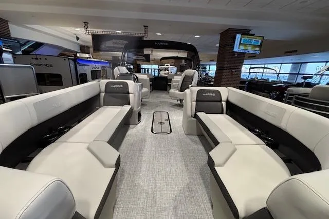 Slide: The Image of 2026 Harris Cruiser 230 pontoon boat interior with spacious seating and modern design. - 11