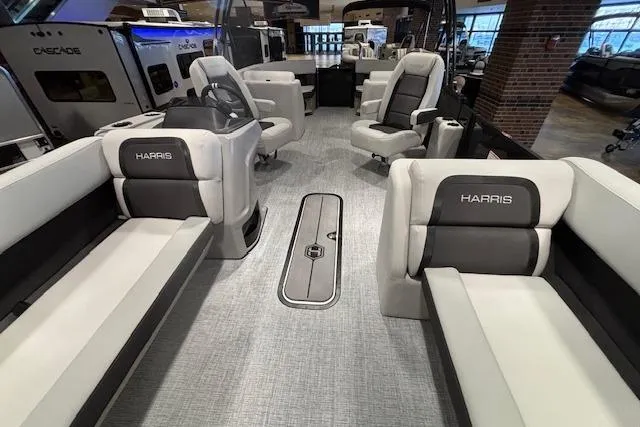 Slide: The Image of Interior of 2026 Harris Cruiser 230 boat with luxurious seating and modern design. - 12