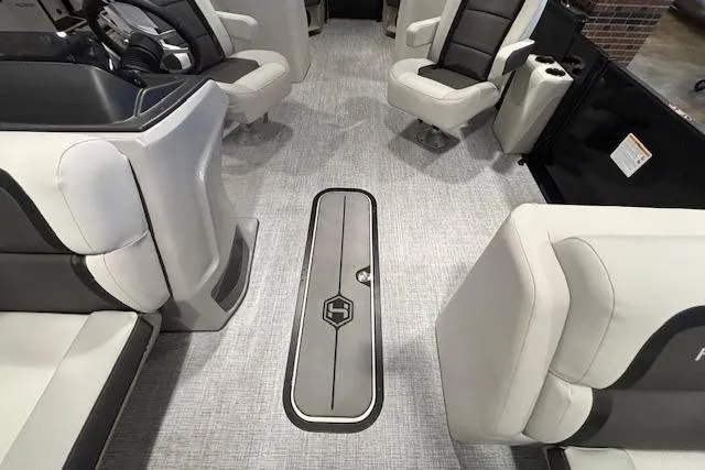 Slide: The Image of Interior of 2026 Harris Cruiser 230 pontoon boat with modern seating and flooring. - 13