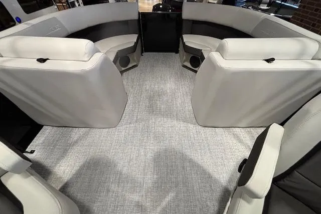 Slide: The Image of 2026 Harris Cruiser 230 interior with spacious seating and modern design. - 16