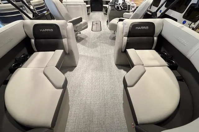 Slide: The Image of 2026 Harris Cruiser 230 interior with luxurious seating and modern design. - 21