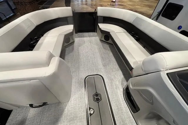 Slide: The Image of 2026 Harris Cruiser 230 interior with spacious seating and modern design. - 30