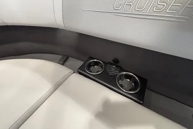Slide: The Image of 2026 Harris Cruiser 230 interior with cup holders and embossed seating. - 33