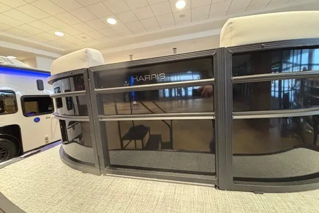 Slide: The Image of 2026 Harris Cruiser 230 pontoon boat interior with modern design and sleek finishes. - 5