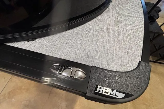 Slide: The Image of 2026 Harris Cruiser 230 boat detail with RPM logo and sleek design. - 9