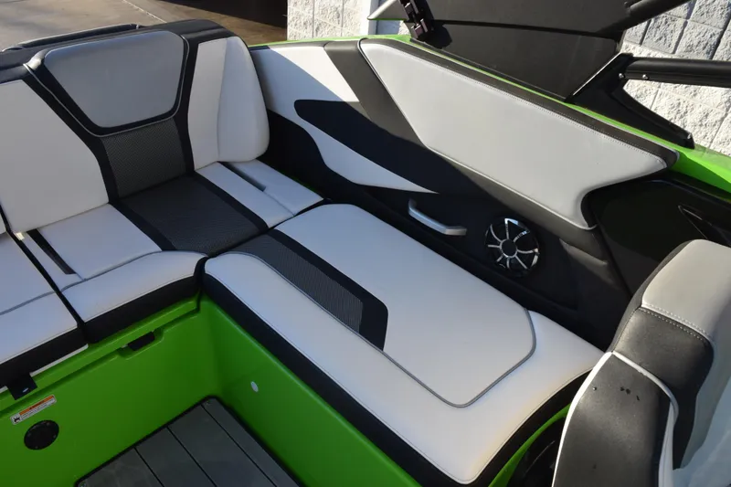 Slide: The Image of 2022 Yamaha Boats 255XD interior with sleek seating and modern design. - 13