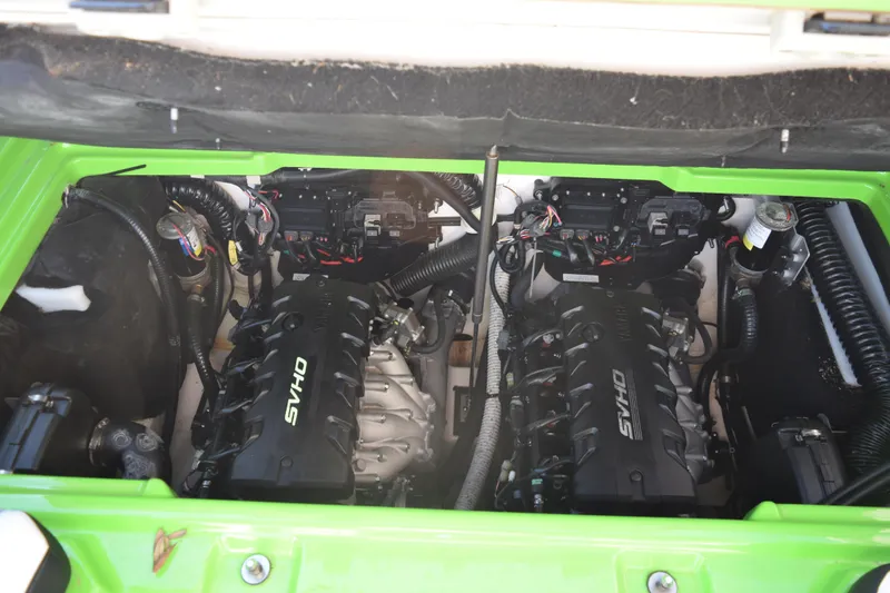 Slide: The Image of 2022 Yamaha Boats 255XD engine compartment with dual SVHO engines. - 31