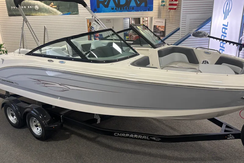 Slide: The Image of 2026 Chaparral 21 SSi Ski & Fish boat on display in showroom. - 7