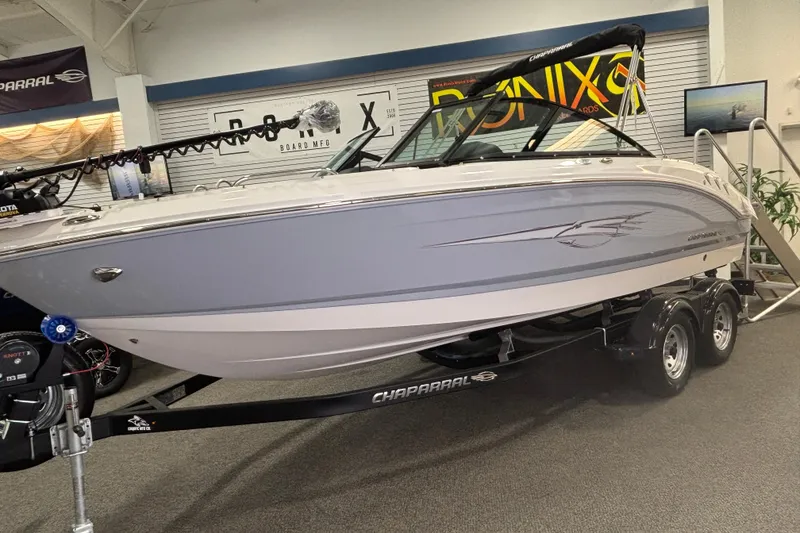 Slide: The Image of 2026 Chaparral 21 SSi Ski & Fish boat in showroom. - 1