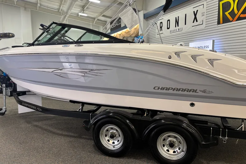 Slide: The Image of 2026 Chaparral 21 SSi Ski & Fish boat in showroom. - 20