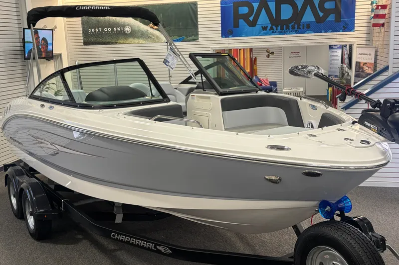 Slide: The Image of 2026 Chaparral 21 SSi Ski & Fish boat in showroom. - 9