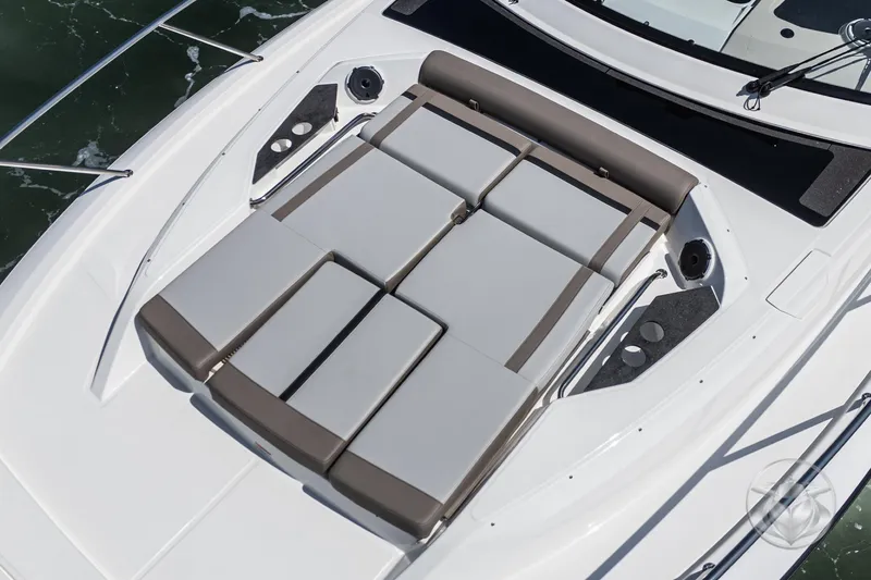 Slide: The Image of 2025 Boston Whaler 405 Conquest boat with cushioned deck seating. - 22