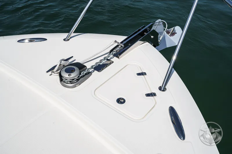 Slide: The Image of Bow of 2025 Boston Whaler 405 Conquest with anchor and chain mechanism. - 25