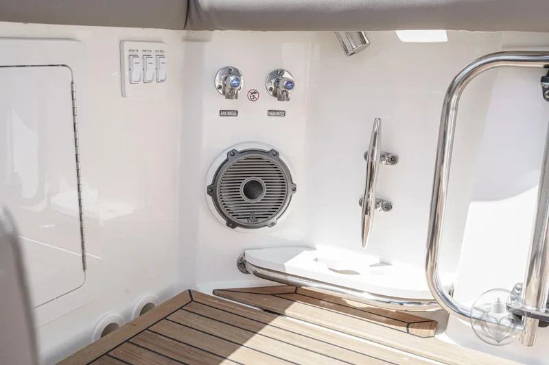 Slide: The Image of 2025 Boston Whaler 405 Conquest boat interior with speaker and control panel. - 39