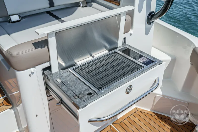 Slide: The Image of Outdoor grill on 2025 Boston Whaler 405 Conquest boat, featuring sleek design and functionality. - 44