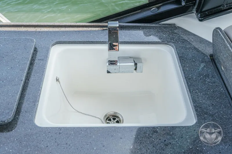 Slide: The Image of Sink with modern faucet on 2025 Boston Whaler 405 Conquest boat. - 48