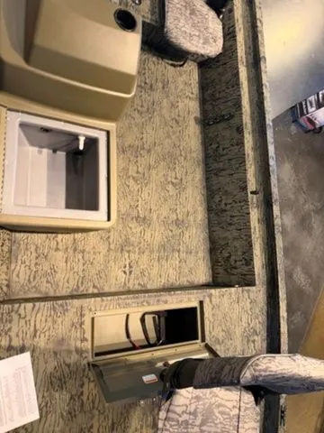 Slide: The Image of Interior of the 2026 Grizzly G1754SC boat model. - 3
