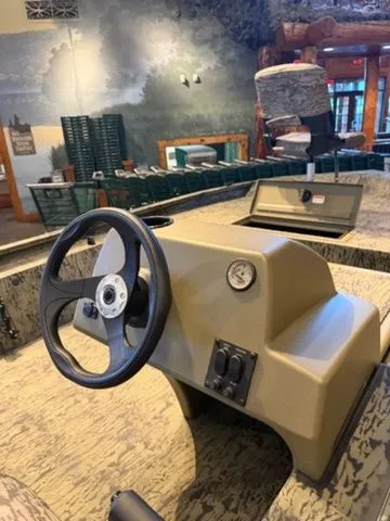 Slide: The Image of Interior view of Grizzly G1754SC boat, model year 2026. - 4