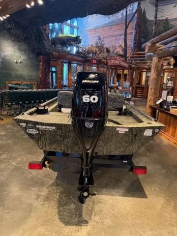 Slide: The Image of Grizzly G1754SC 2026 boat with Mercury 60 engine in rustic setting. - 6