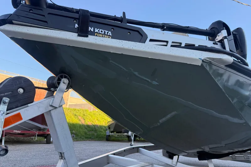 Slide: The Image of 2021 Xpress X18PFC boat on trailer with Minn Kota Fortrex motor. - 39