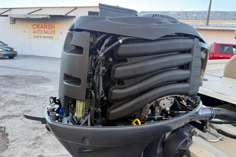 Slide: The Image of 2021 Xpress X18PFC boat engine, detailed view, Cransh Auto Sales in background. - 47