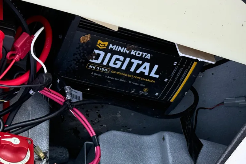 Slide: The Image of 2021 Xpress X18PFC boat with Minn Kota digital onboard battery charger. - 79