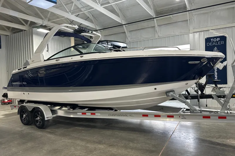 The Image of 2026 Chaparral SSX 8 on trailer in showroom. - 1