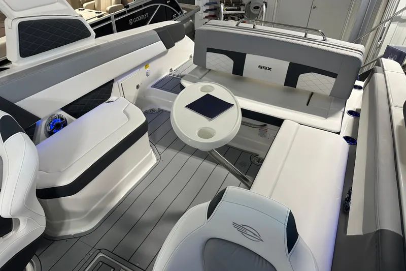 Slide: The Image of Interior of Chaparral SSX 8 boat, 2026 model, featuring luxurious seating. - 13