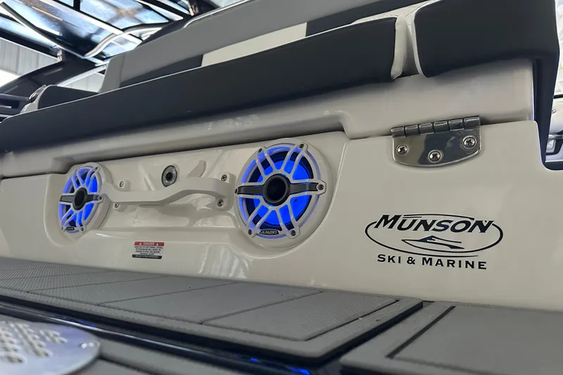 Slide: The Image of Chaparral SSX 8 2026 boat with blue speakers and Munson logo. - 21
