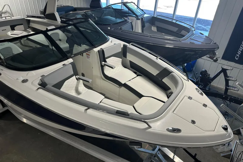Slide: The Image of 2026 Chaparral SSX 8 boat in showroom. - 6