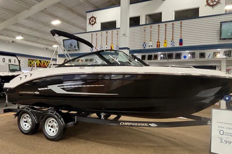 The Image of 2026 Chaparral 21 SSi boat in showroom. - 0