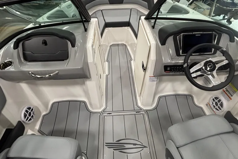 Slide: The Image of Interior of 2026 Chaparral 21 SSi with gray seating and steering wheel. - 12