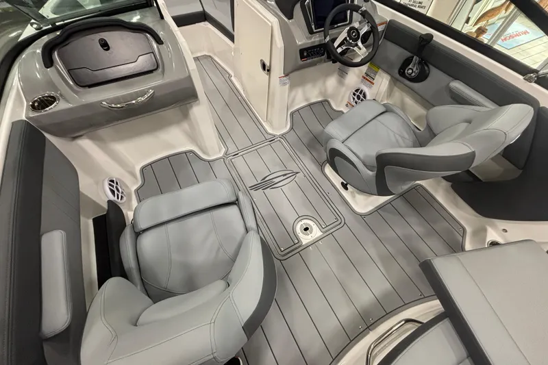 Slide: The Image of Interior of 2026 Chaparral 21 SSi with gray seating. - 13