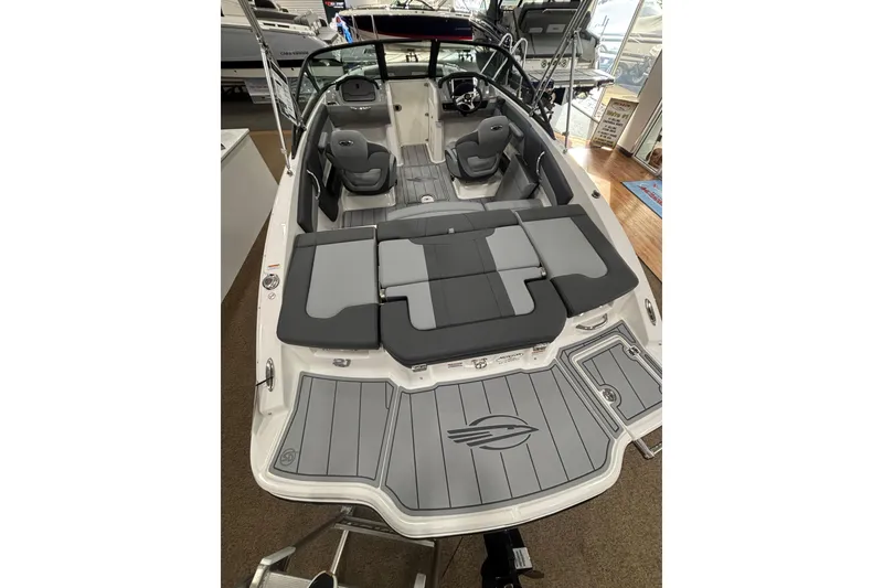 Slide: The Image of Chaparral 21 SSi 2026 boat with gray seating and modern design. - 18