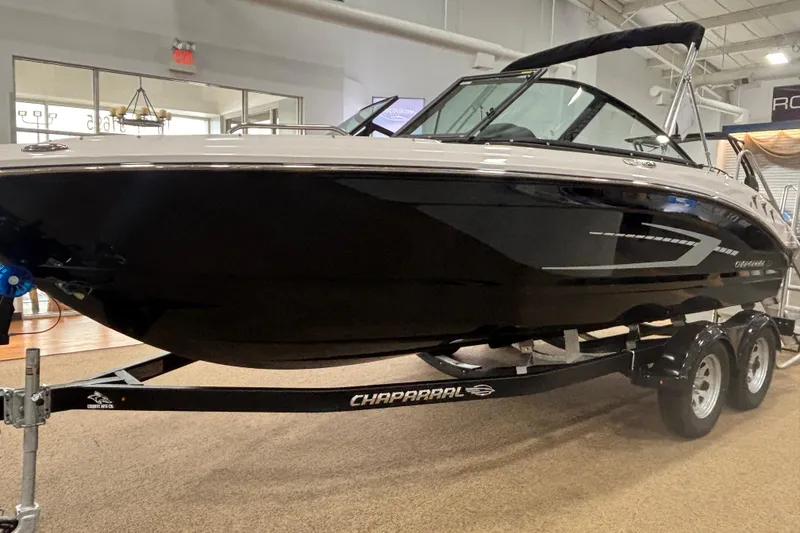 Slide: The Image of 2026 Chaparral 21 SSi boat on trailer in showroom. - 4