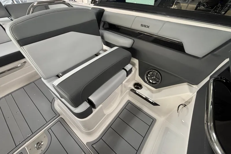 Slide: The Image of 2026 Chaparral SSX 4 boat interior with sleek seating and modern design elements. - 12