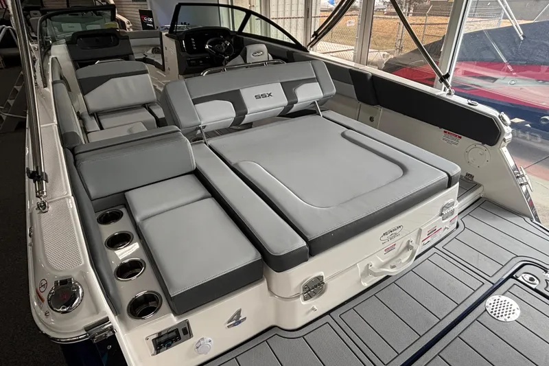Slide: The Image of 2026 Chaparral SSX 4 boat interior with gray seating and modern design. - 24