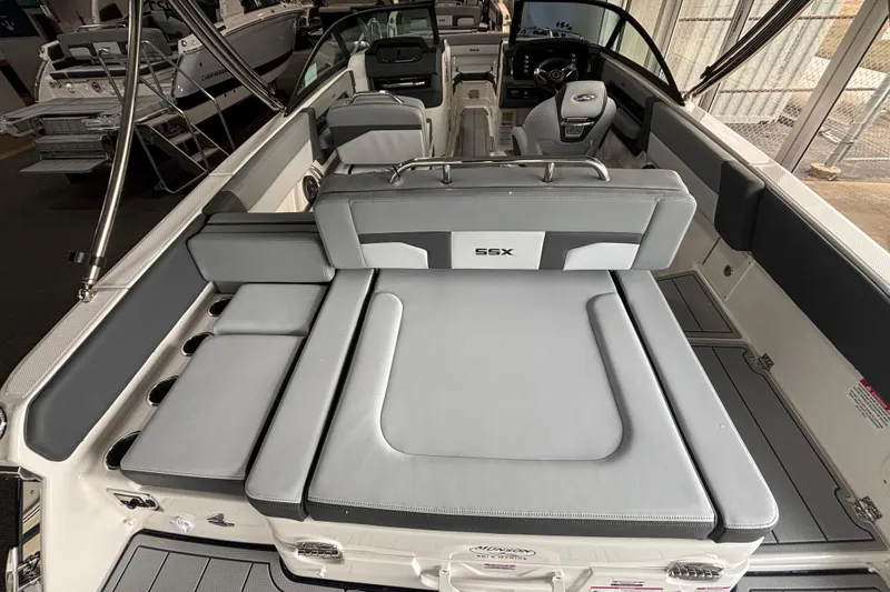 Slide: The Image of 2026 Chaparral SSX 4 boat interior with gray seating and modern design. - 7